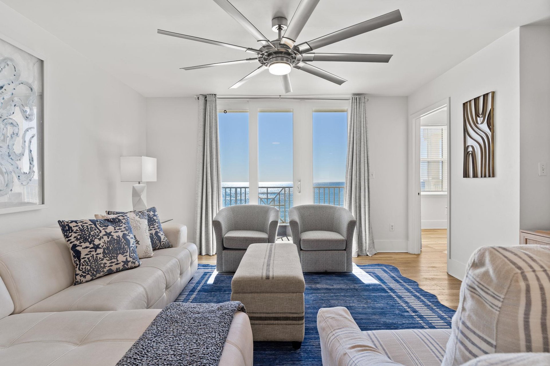 Relax in your bright living room with direct gulf views through floortoceiling windows and comfortable seating for your entire group.