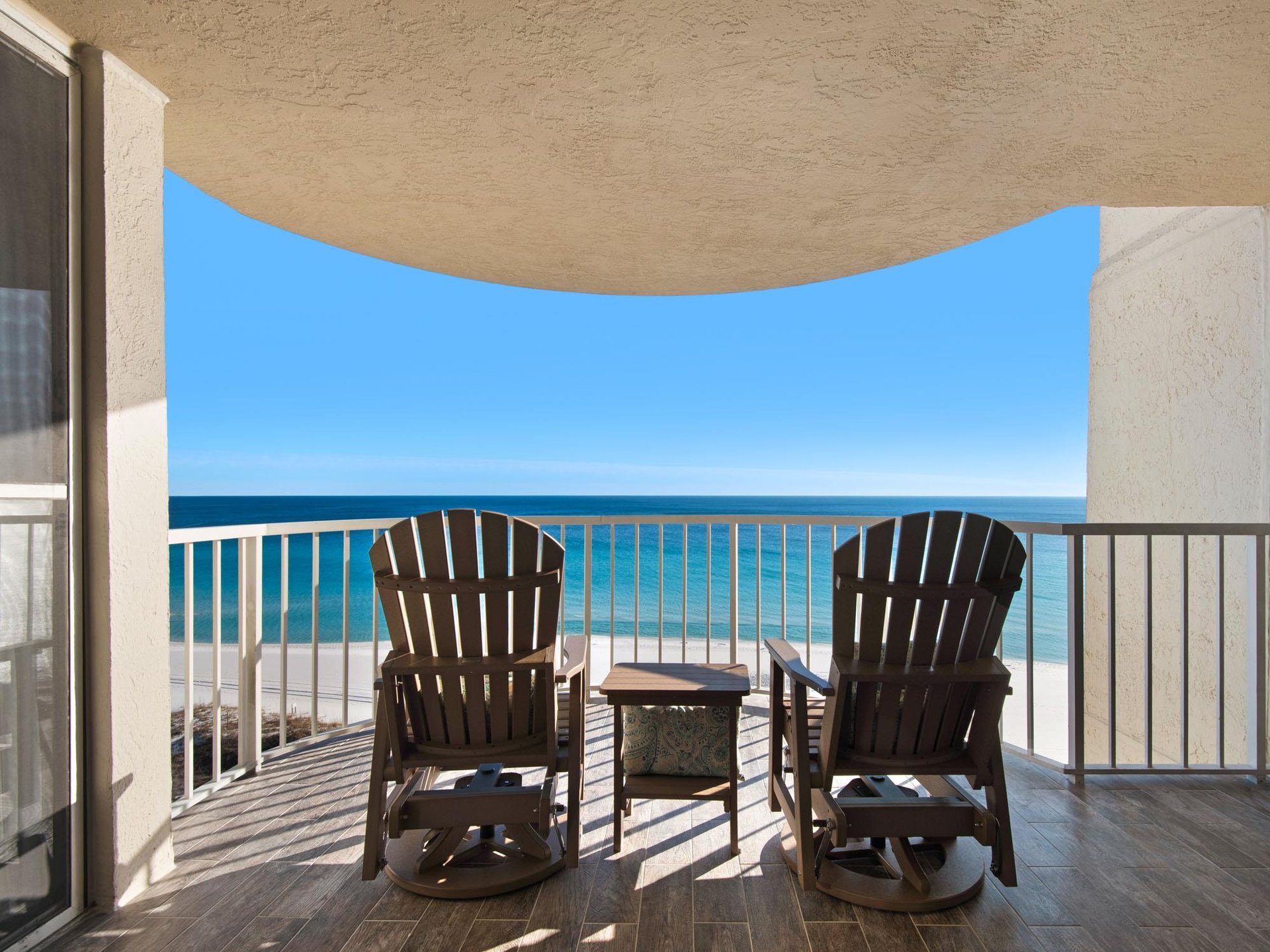 Sink into these Gulf front chairs and let the endless sea views wash your worries away from your private balcony.