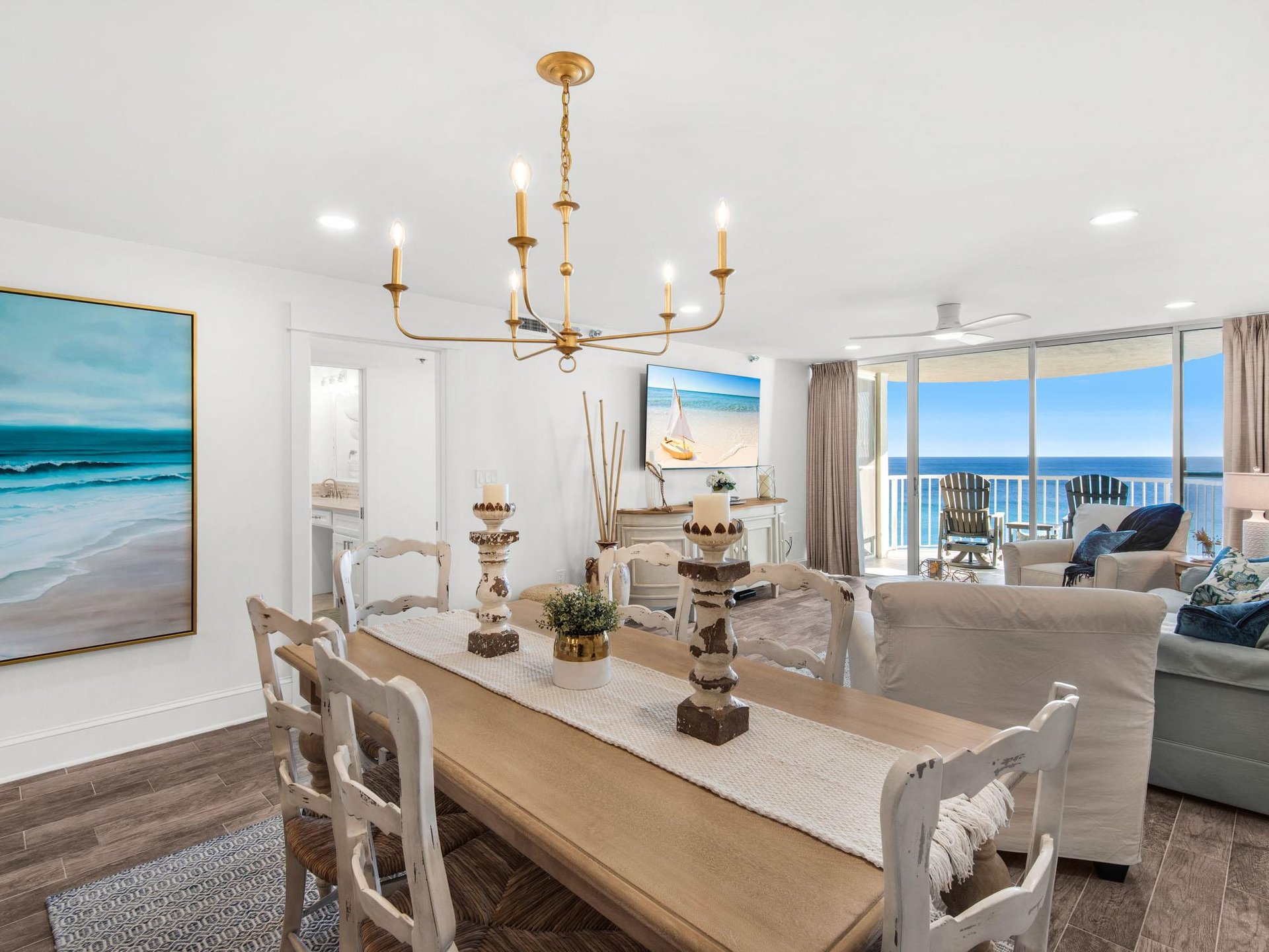 Unwind in this elegant beachfront space where ocean views flow through floortoceiling windows, creating your perfect coastal retreat.