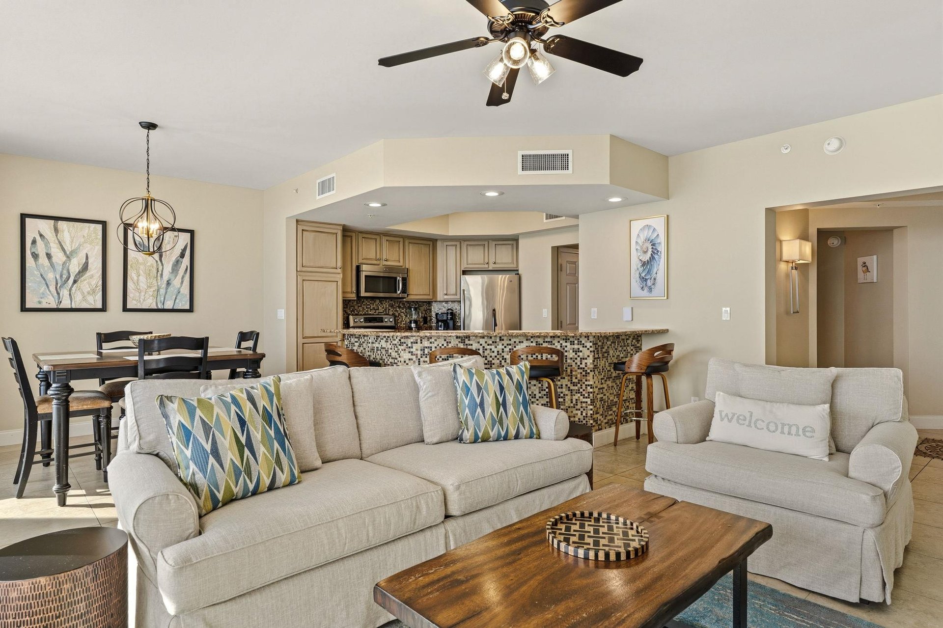 Settle into your openconcept living space where coastal comfort meets modern convenience, complete with full kitchen and dining.