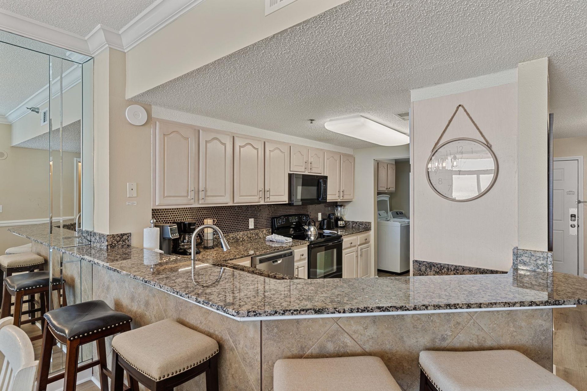 Kitchen with a breakfast bar to enjoy morning coffee and conversations.