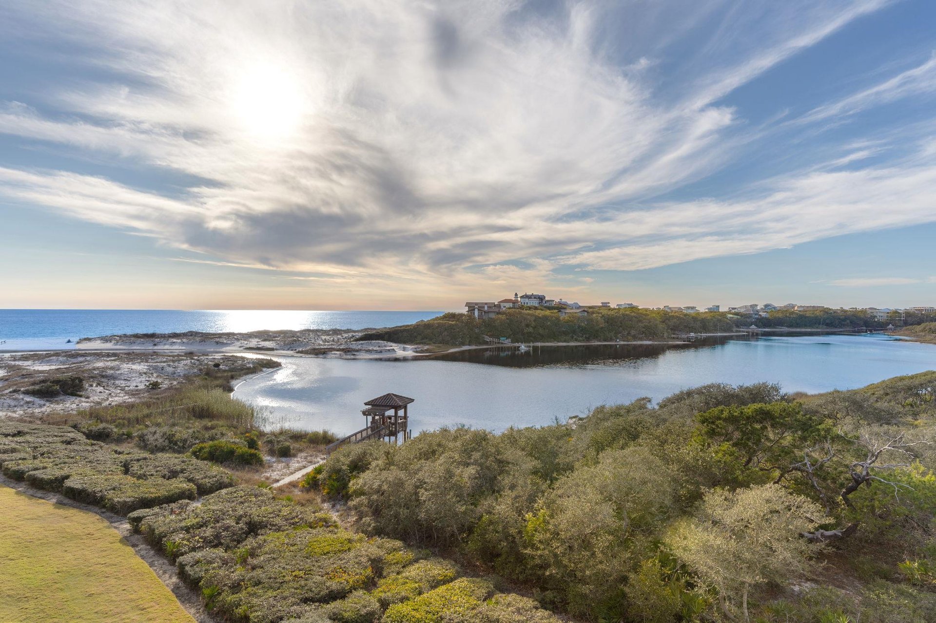 Stunning coastal landscape features gulf front views, pristine waterways, and native vegetation.