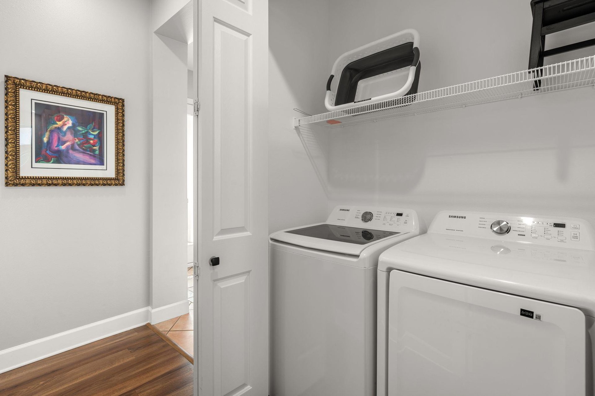 Dedicated laundry room keeps your vacation wardrobe fresh with fullsize washer and dryer, plus convenient storage shelving.