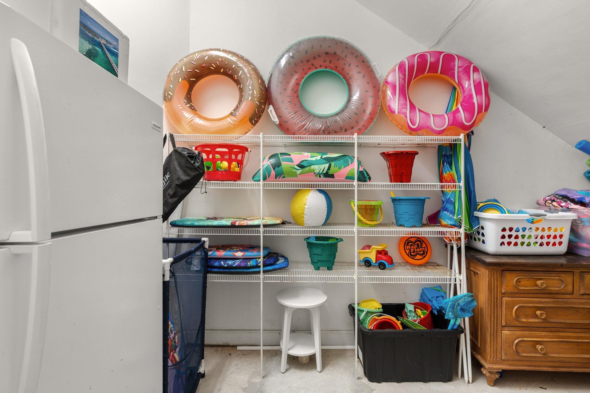 Your beach gear awaits Colorful pool floats, toys, and summer essentials are perfectly organized for instant fun.