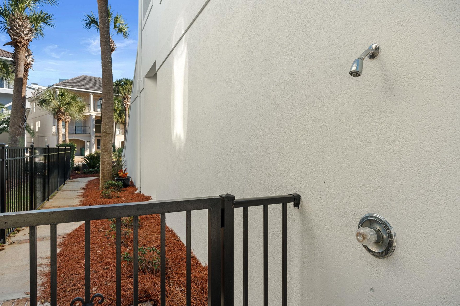 Rinse away beach sand in your private outdoor shower, surrounded by tropical palms and coastal breezes.