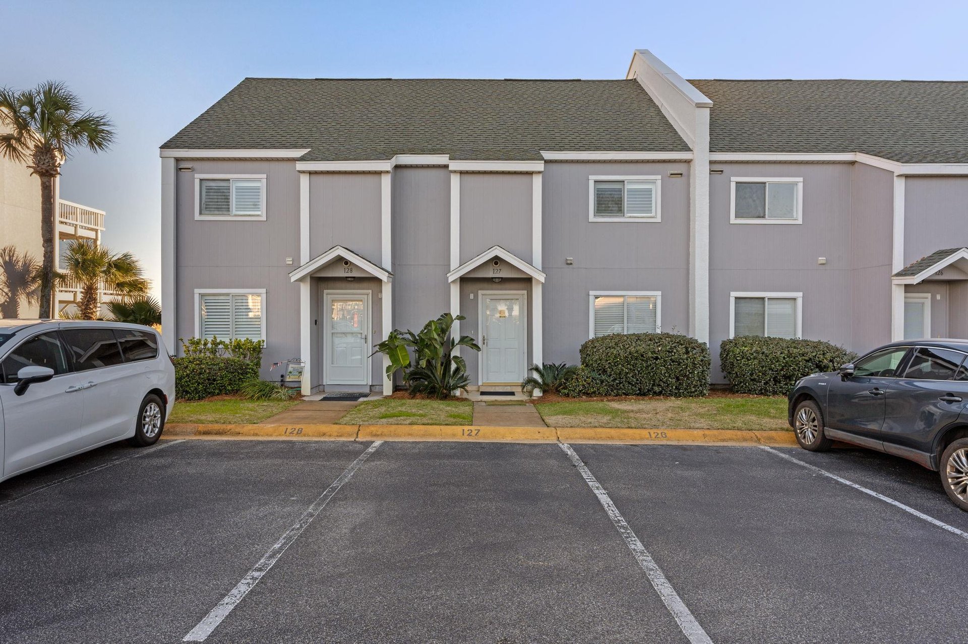 Modern townhousestyle building with convenient parking spaces directly outside each units entrance.