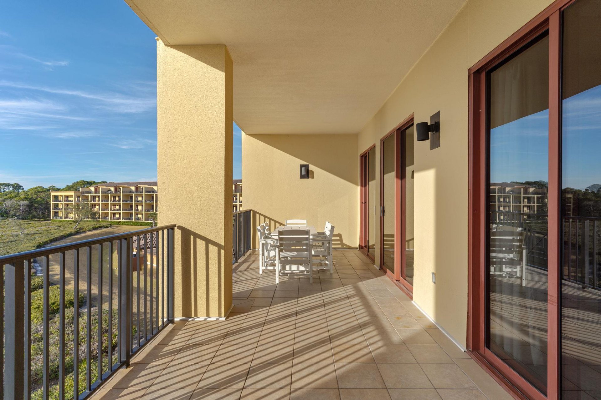 Step onto your private terrace and breathe in the fresh air while enjoying outdoor dining with scenic views stretching beyond.