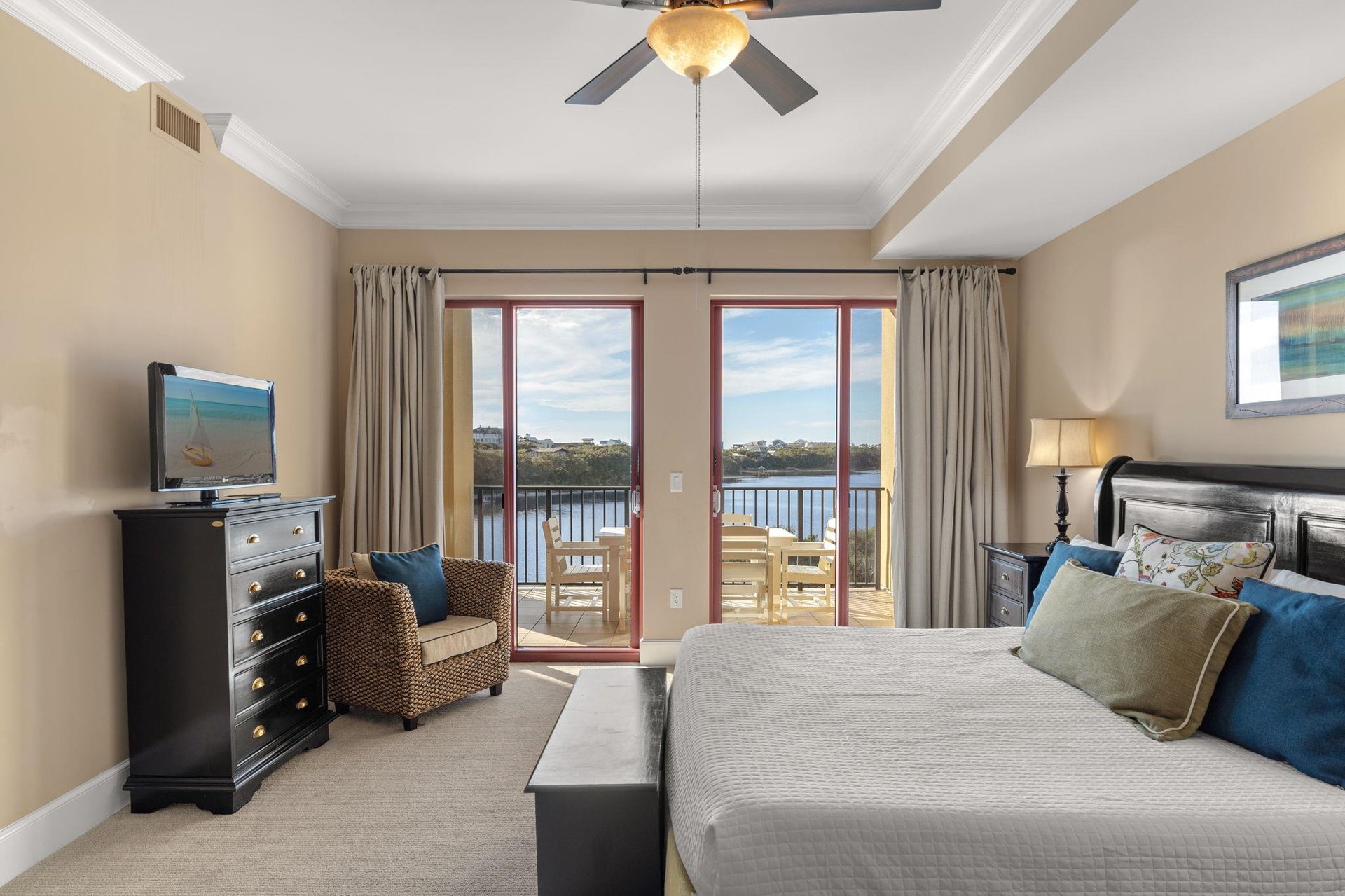 Wake up to breathtaking water views through your private balcony doors. Elegant furnishings and coastal charm create the perfect retreat for rest and relaxation.