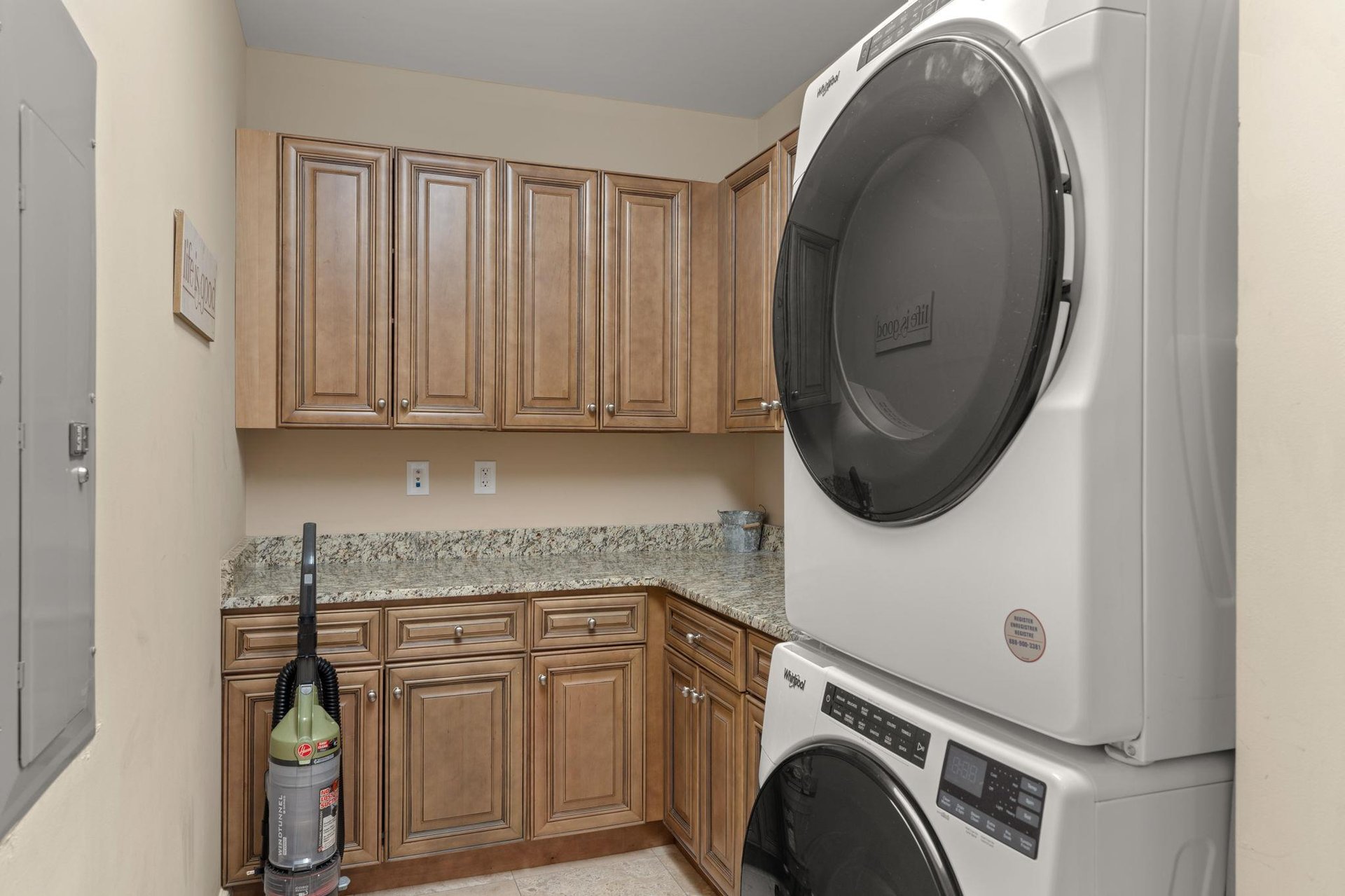 Your dedicated laundry room features fullsized washer and dryer with ample cabinetry for convenient storage during your stay.
