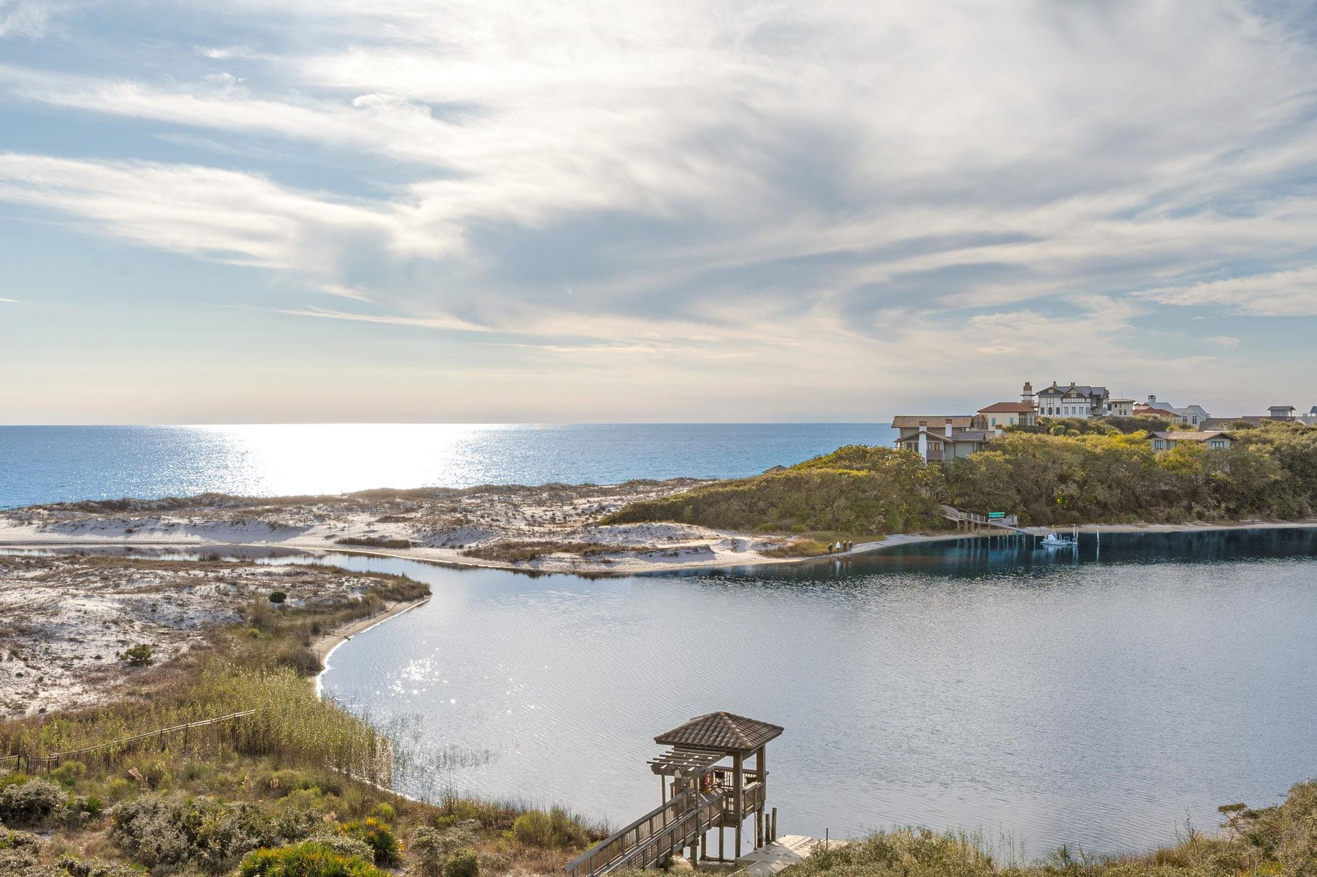 Coastal paradise with pristine beaches, turquoise waters, and charming oceanfront homes creating the perfect seaside escape.