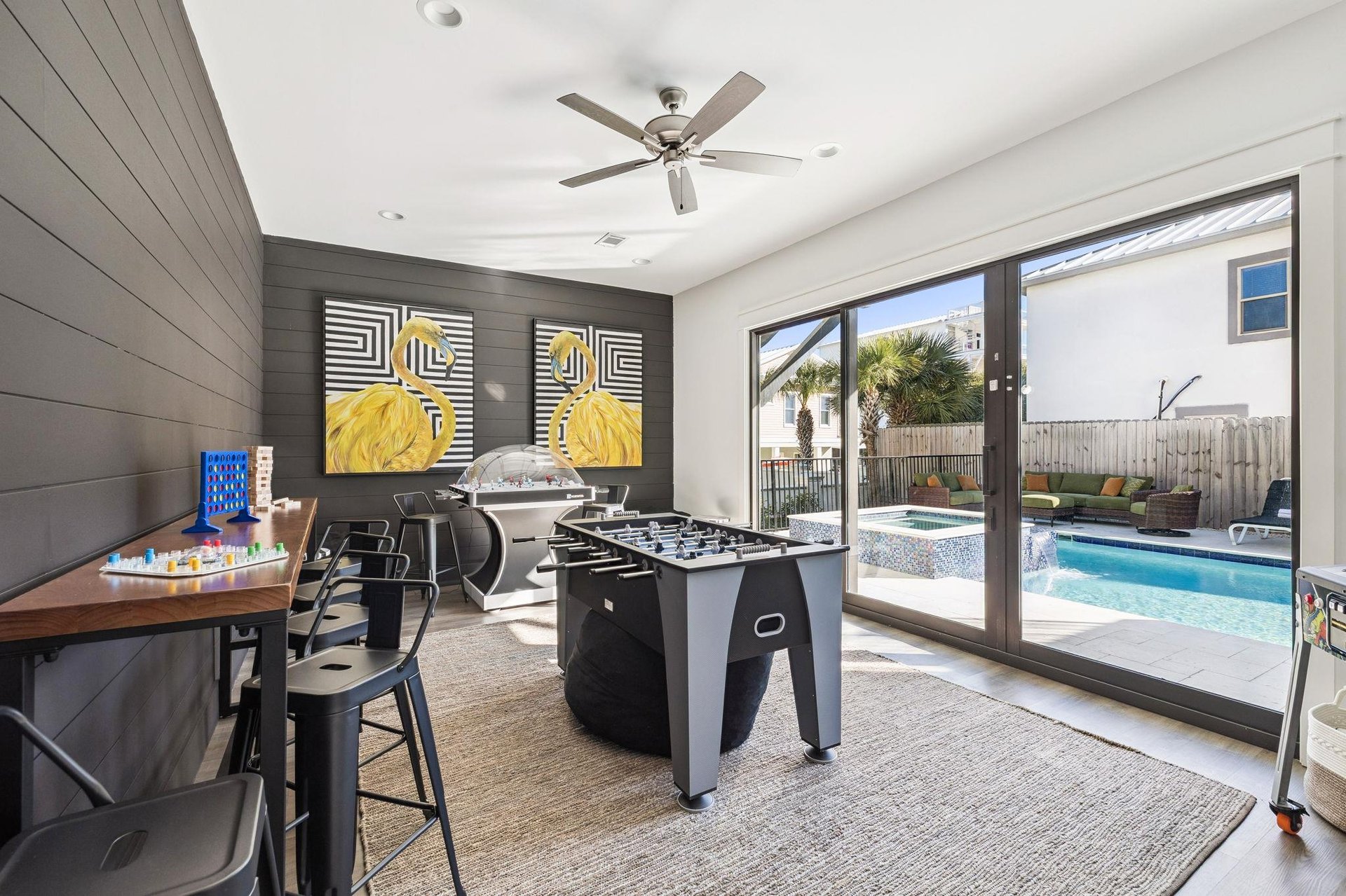 Challenge friends to foosball while enjoying the pool view