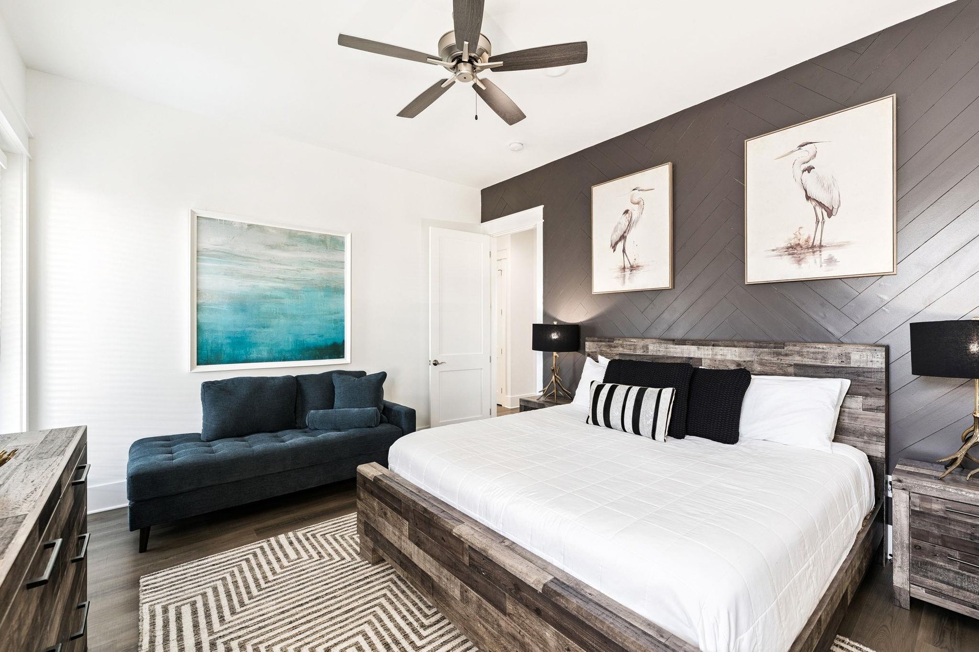 Unwind in your coastalinspired bedroom with rustic wood accents, crisp linens, and a cozy reading nook by the window.