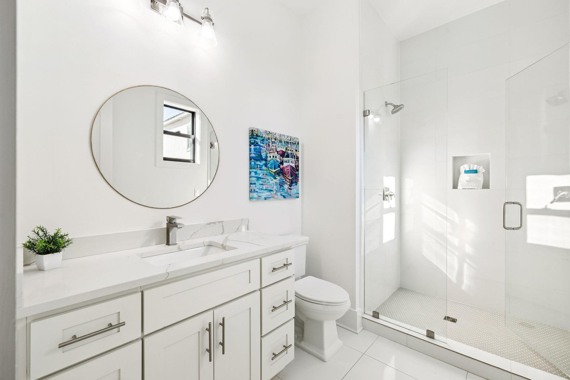 Step into your pristine bathroom oasis with marble countertops, walkin shower, and thoughtful touches that make your stay feel luxurious.