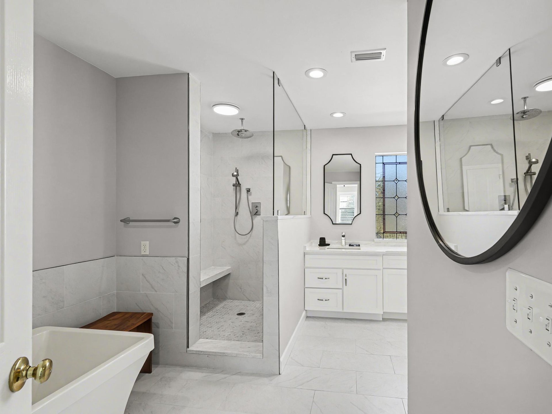 Indulge in your private spalike bathroom with dual vanities, walkin shower, and soaking tub for ultimate relaxation.