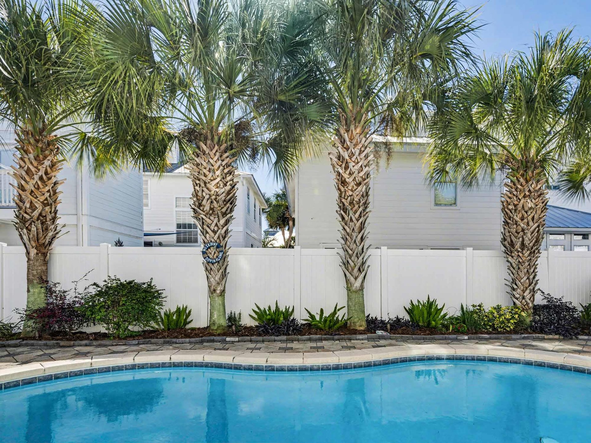 Dive into your private tropical oasis, where swaying palms frame crystalclear waters and create the perfect backdrop for relaxation.