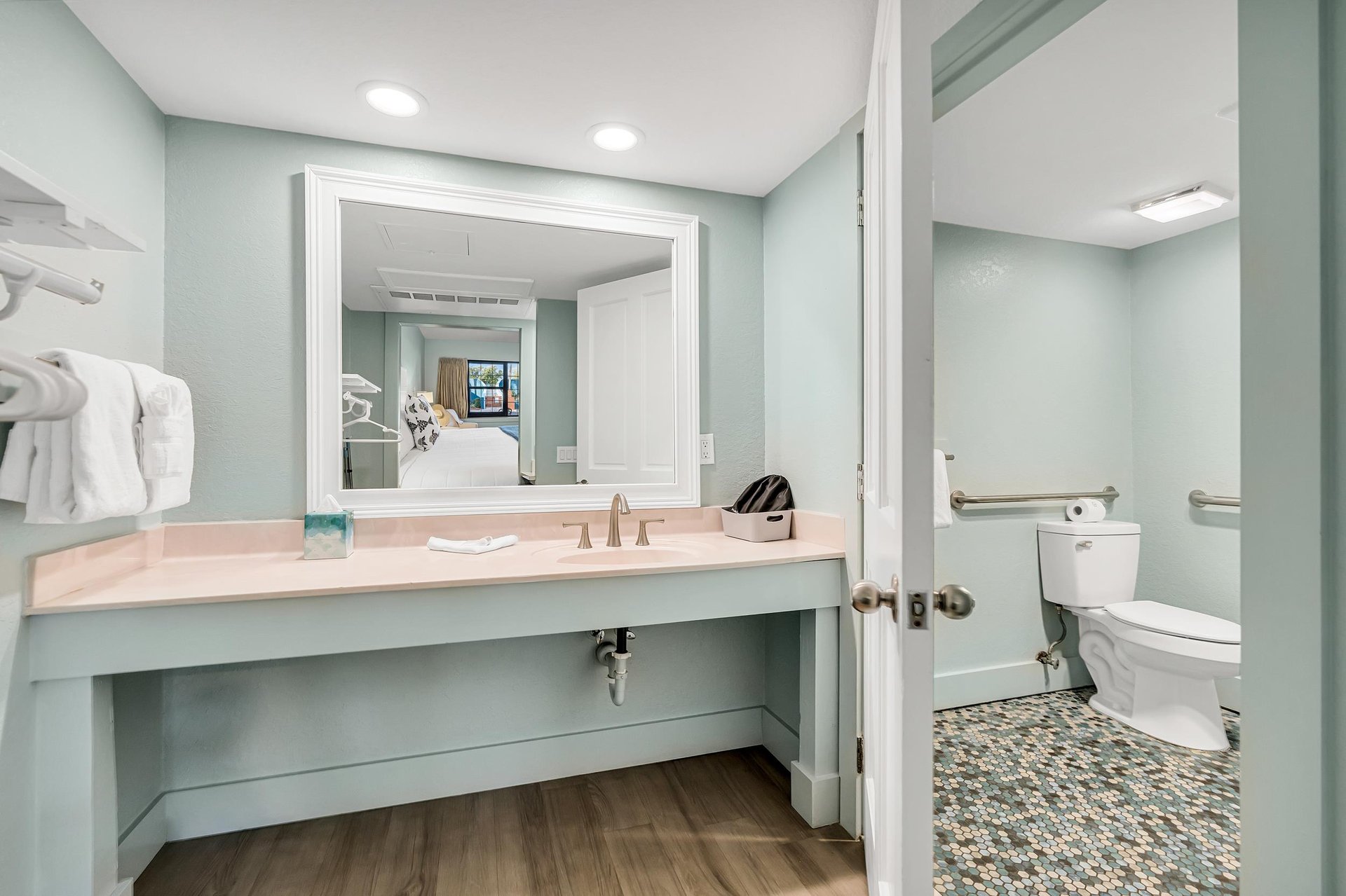 Bathroom vanity counter with large mirror