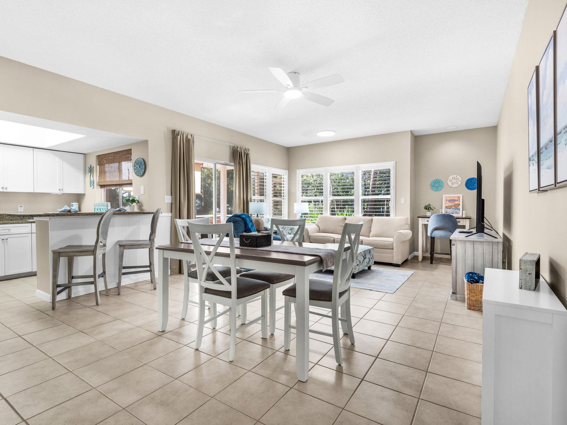 Relax in your bright openplan space where kitchen, dining, and living areas flow seamlessly together for effortless entertaining.