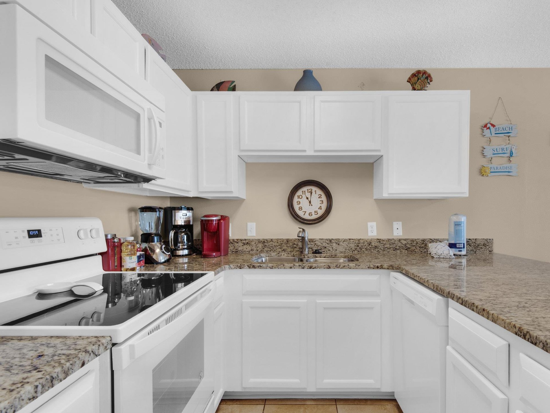 The fully equipped kitchen features, a coffee maker, and everything you need to create memorable vacation meals together.