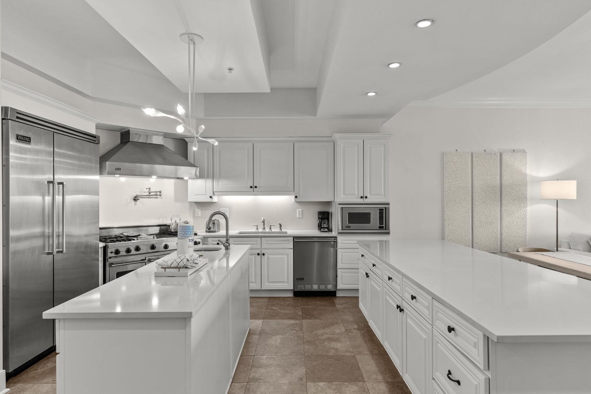 Your chefworthy kitchen awaits with professionalgrade appliances, gleaming countertops, and ample space to create memorable meals together.