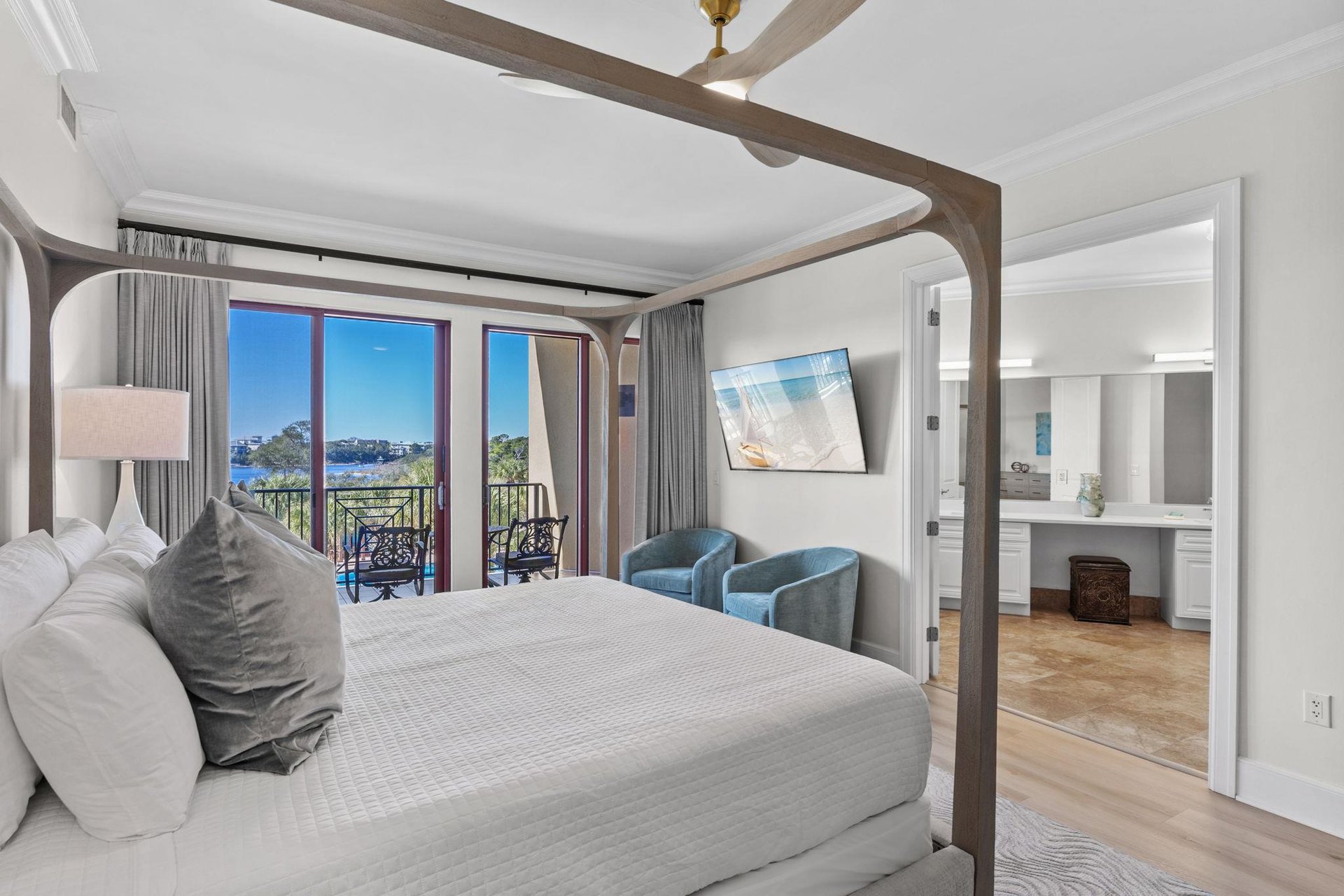 Wake up to stunning water views from your elegant fourposter bed, then step onto your private balcony for morning coffee.