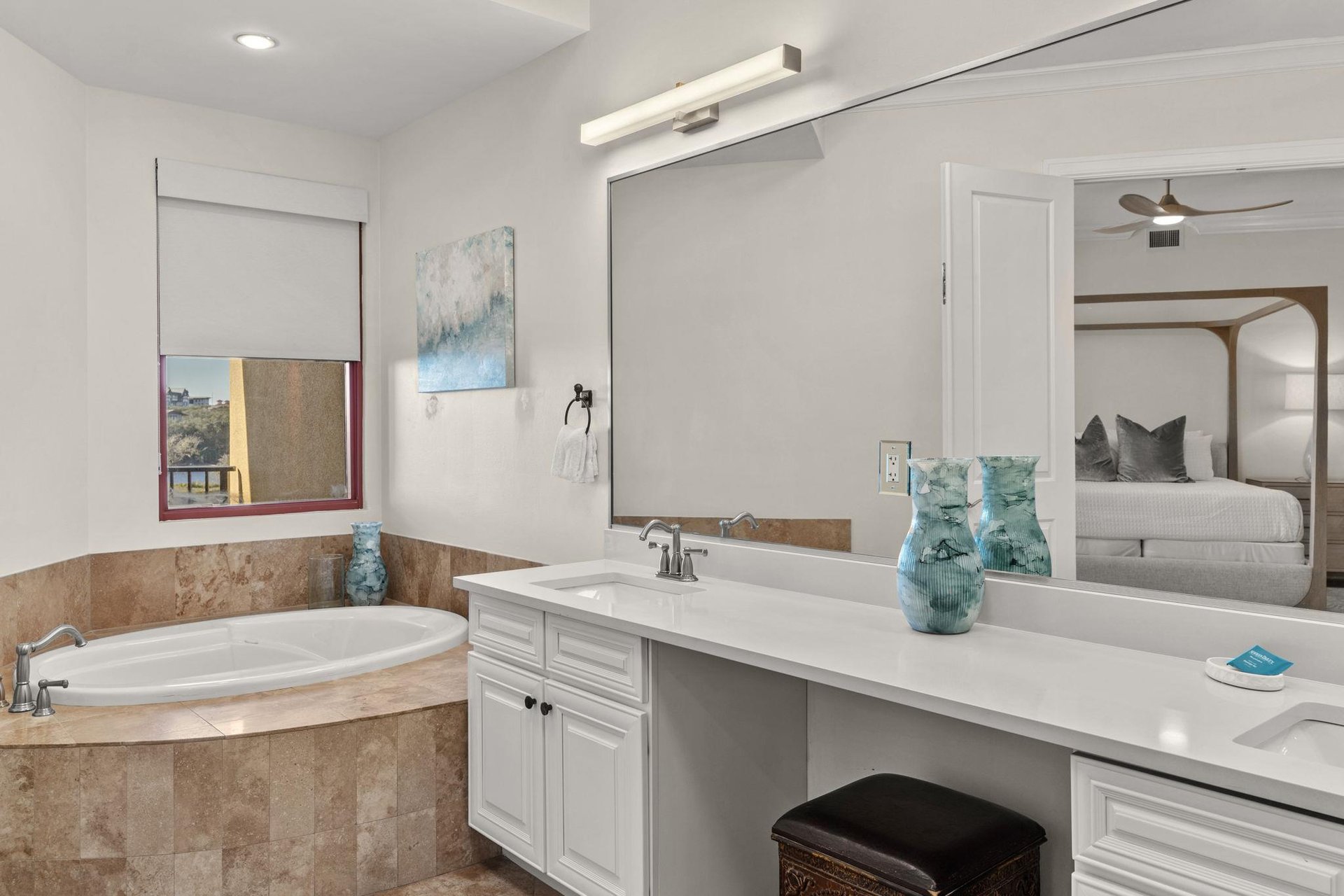 Unwind in your spacious bathroom featuring a luxurious soaking tub, dual vanities, and elegant touches that create your perfect retreat.