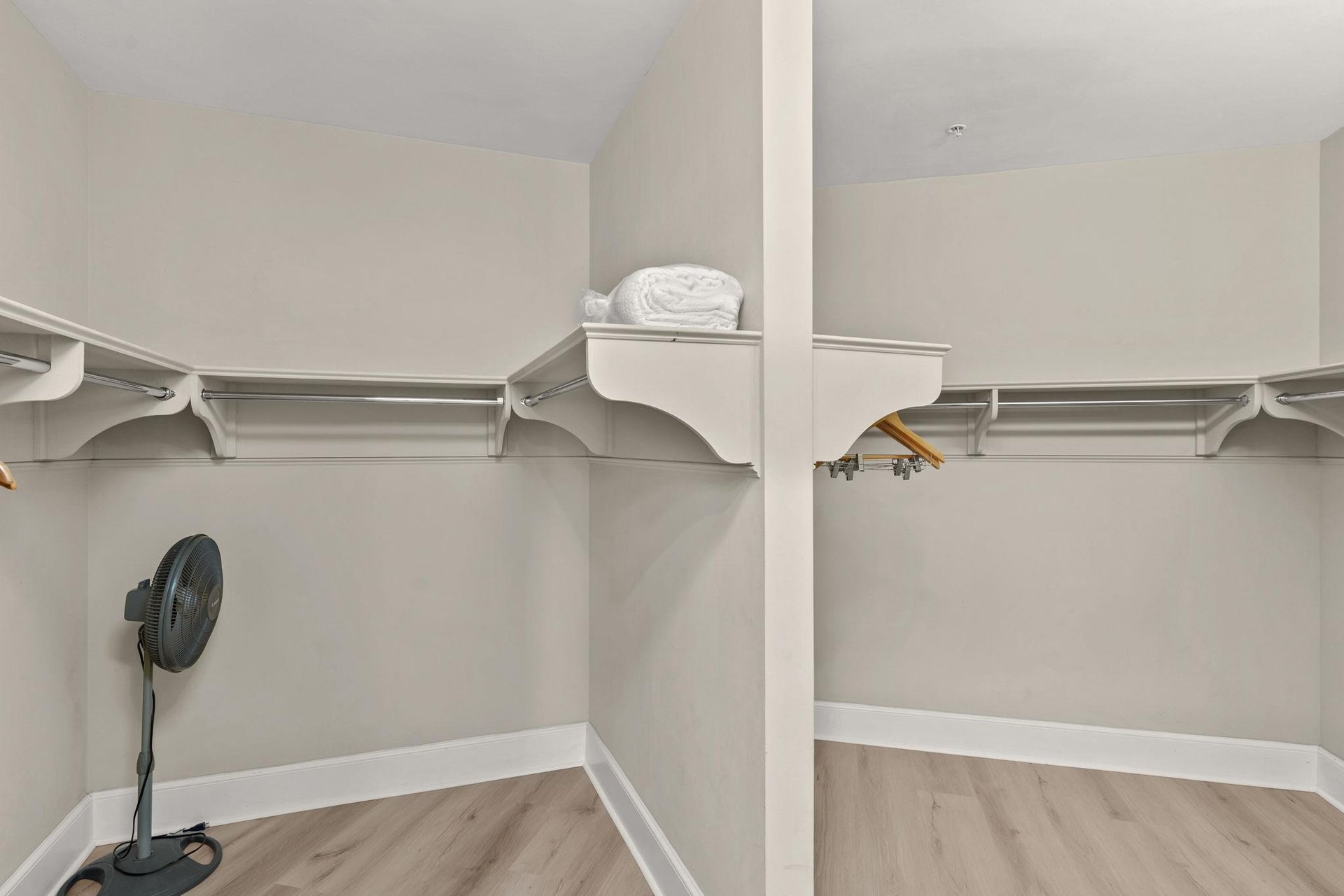 Your spacious walkin closet offers abundant hanging space and thoughtful organization for all your vacation wardrobe needs.