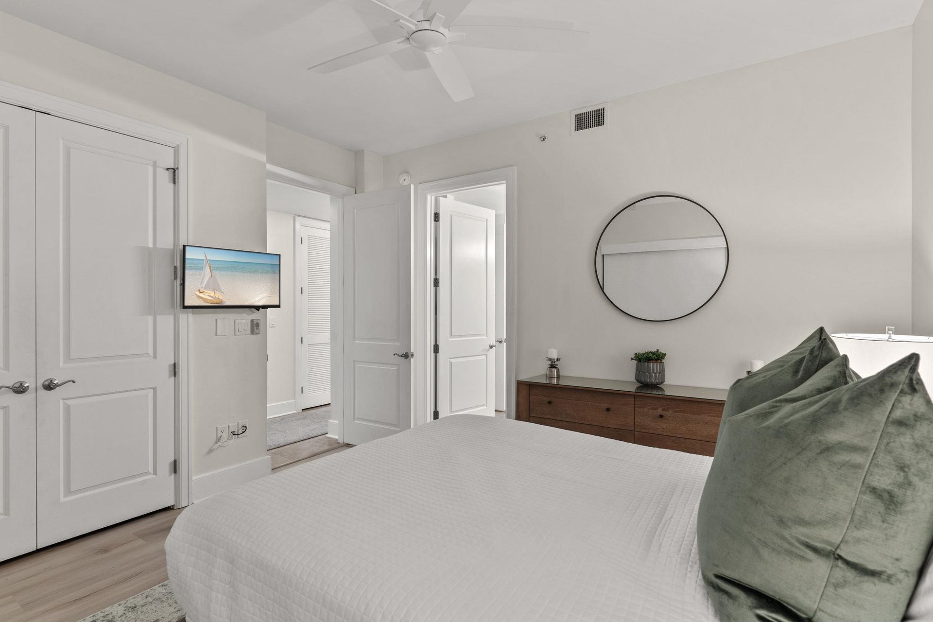 Sink into crisp linens and unwind in your serene bedroom, complete with modern amenities and thoughtful touches for ultimate relaxation.