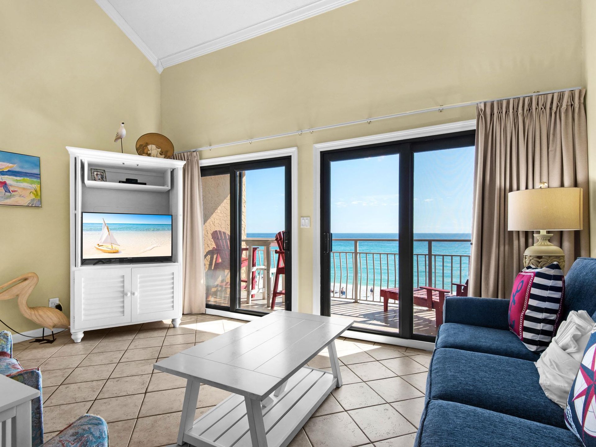 Relax in the bright beachfront living room with stunning sea views from your private balcony and modern comfort touches.