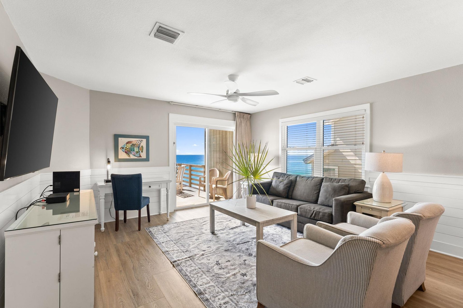 The spacious living room opens to a private Gulf front Balcony