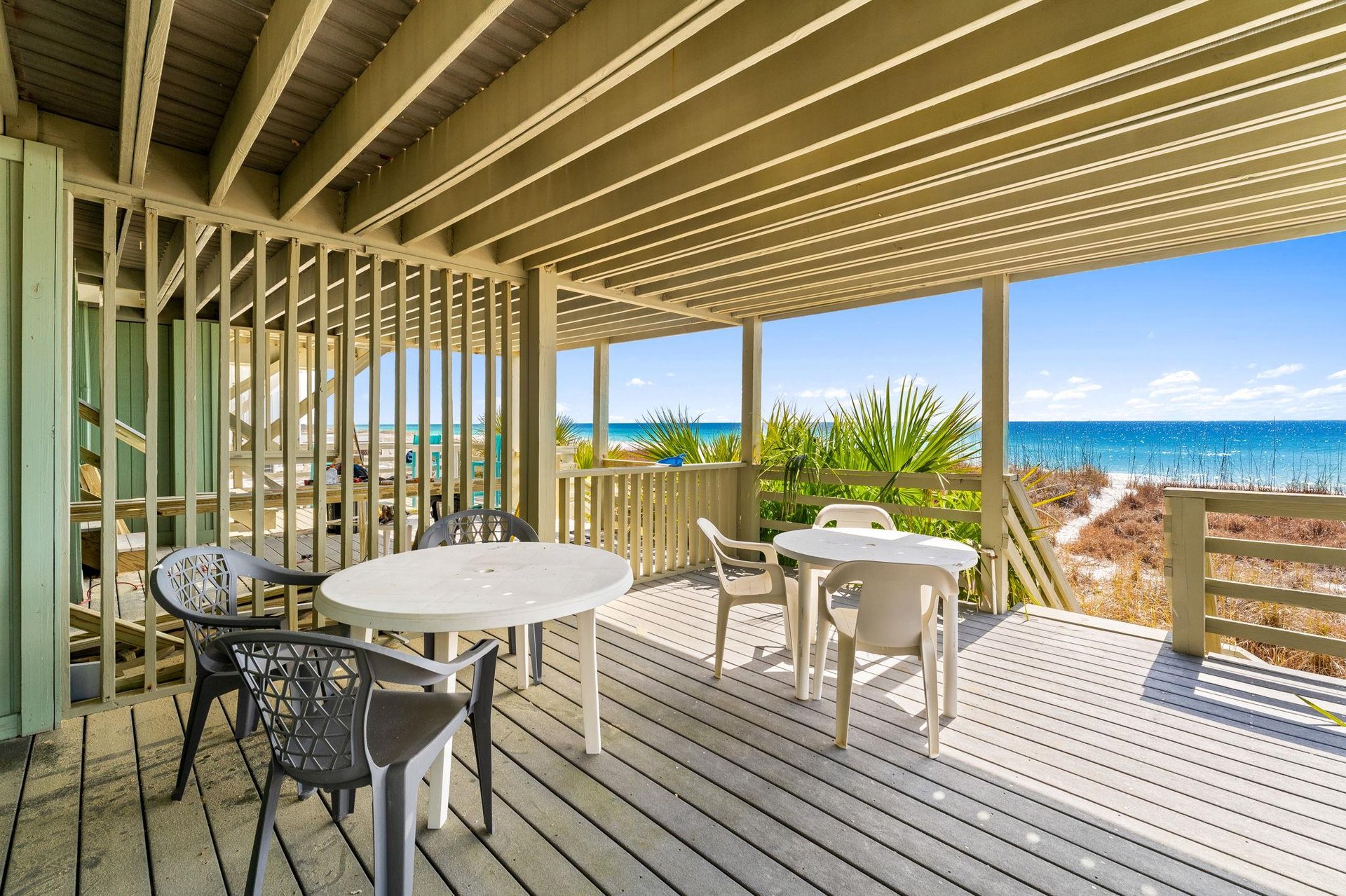 The lower level balcony offers easy, direct access to the beach