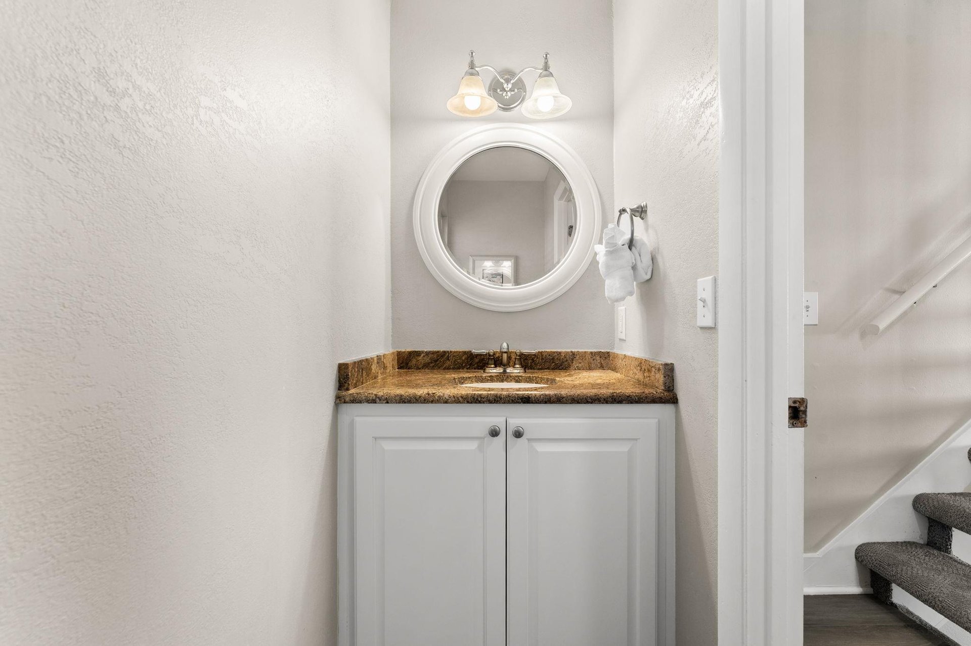 The half bathroom is conveniently located in the main living area