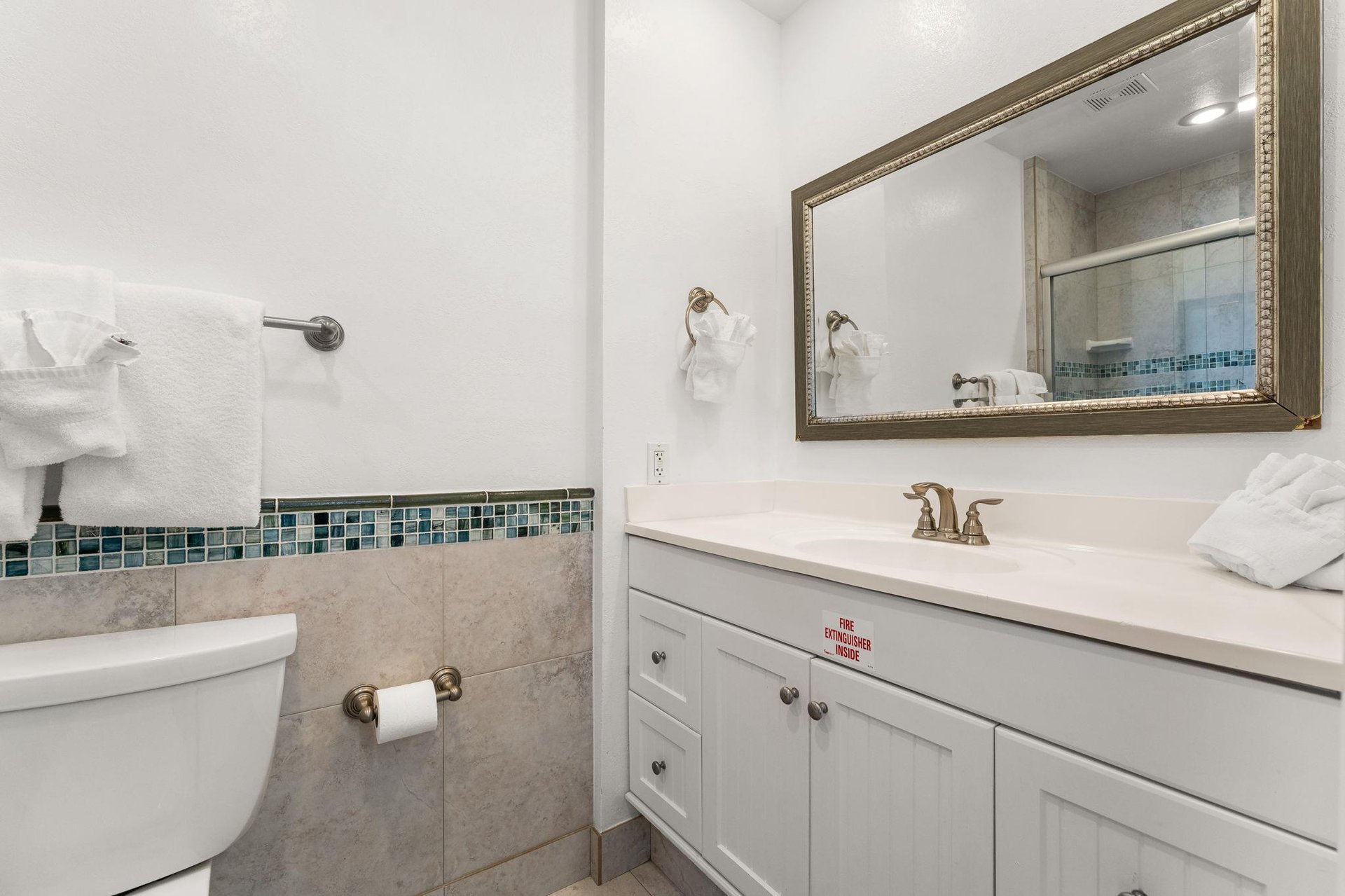 Bathroom 3 with beautiful mosaic tile accents that create a spalike atmosphere.