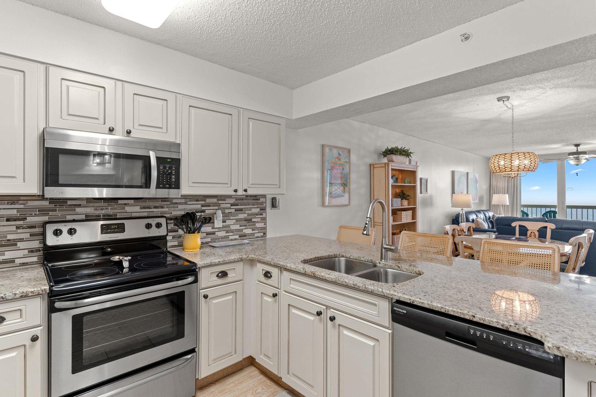 Kitchen open to Dining and living with a Gulf view