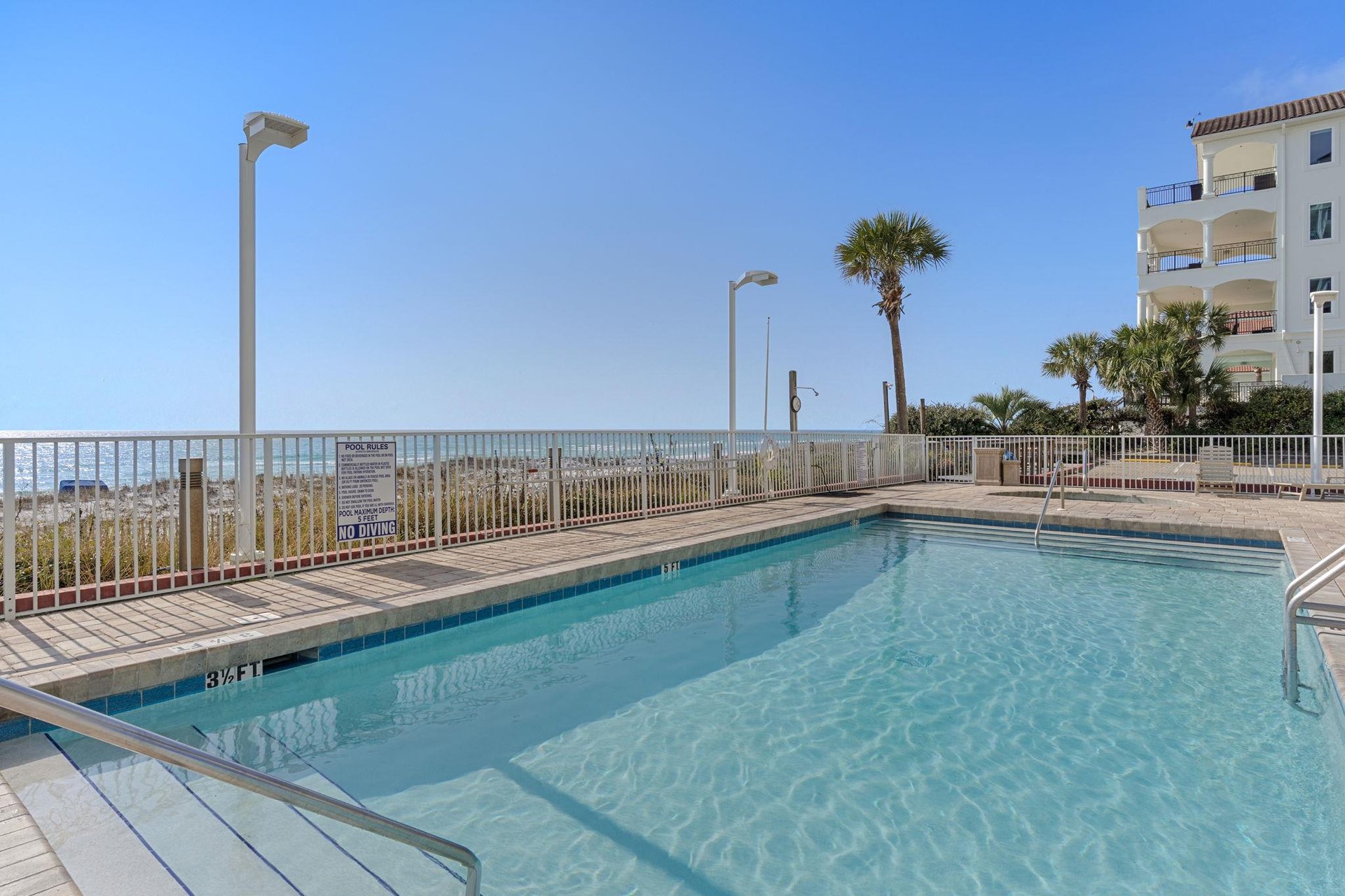 Crystalclear waters await in this gulf front community pool.