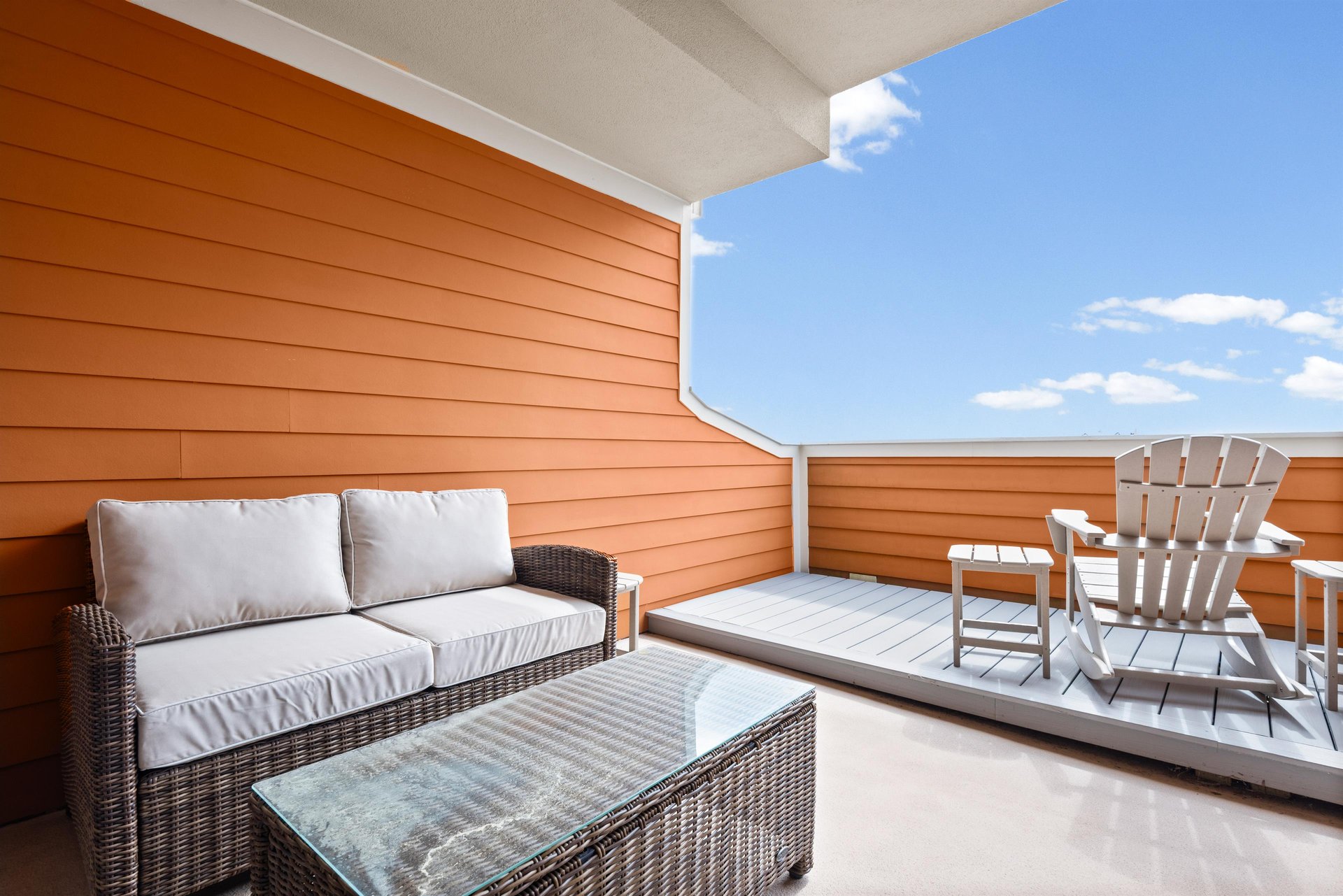 Sink into plush outdoor cushions while enjoying open sky views from your private terrace, complete with stylish seating.