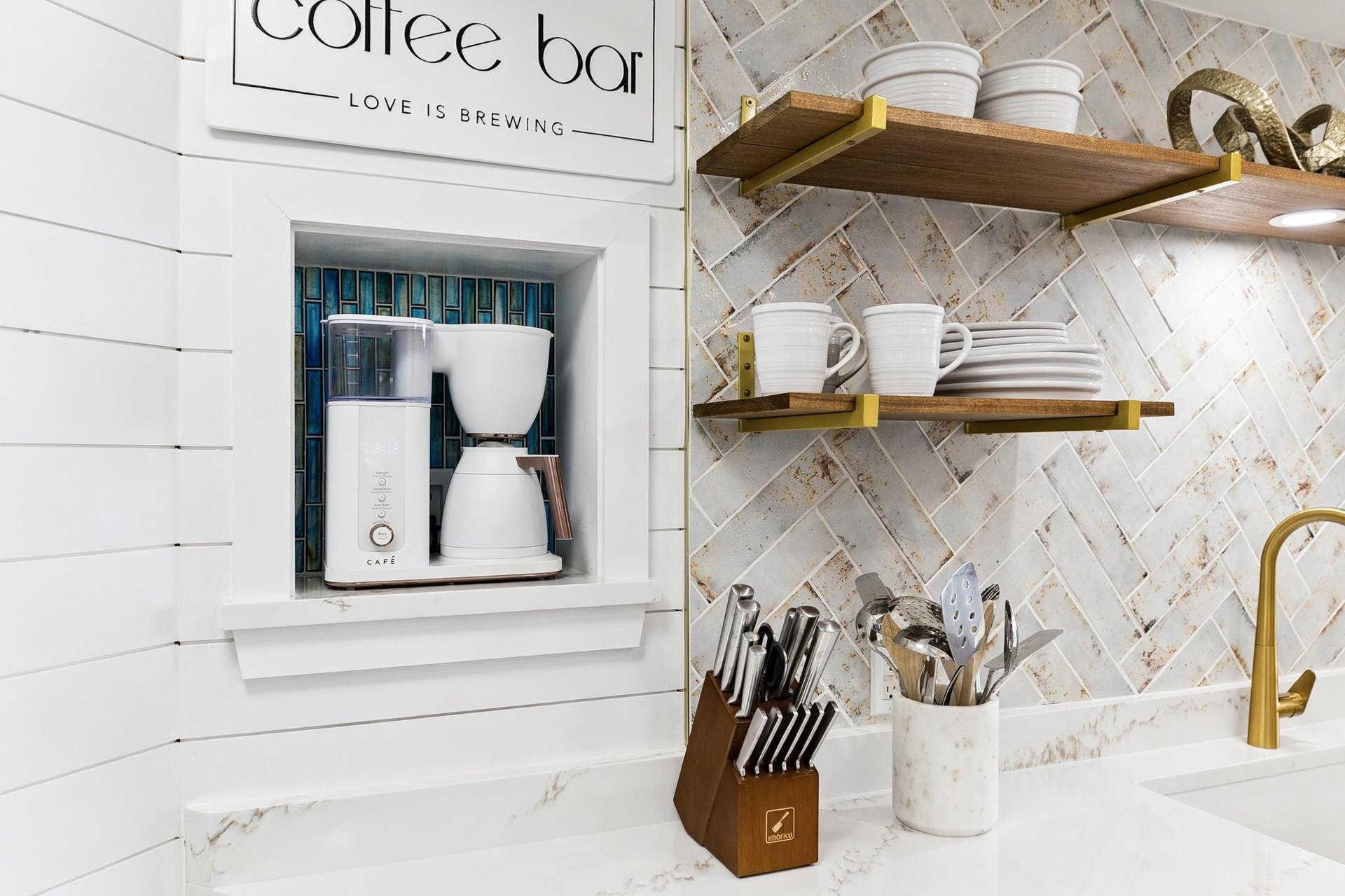 Your coffee bar awaits with premium brewing equipment and beautifully organized shelving for the perfect morning ritual.