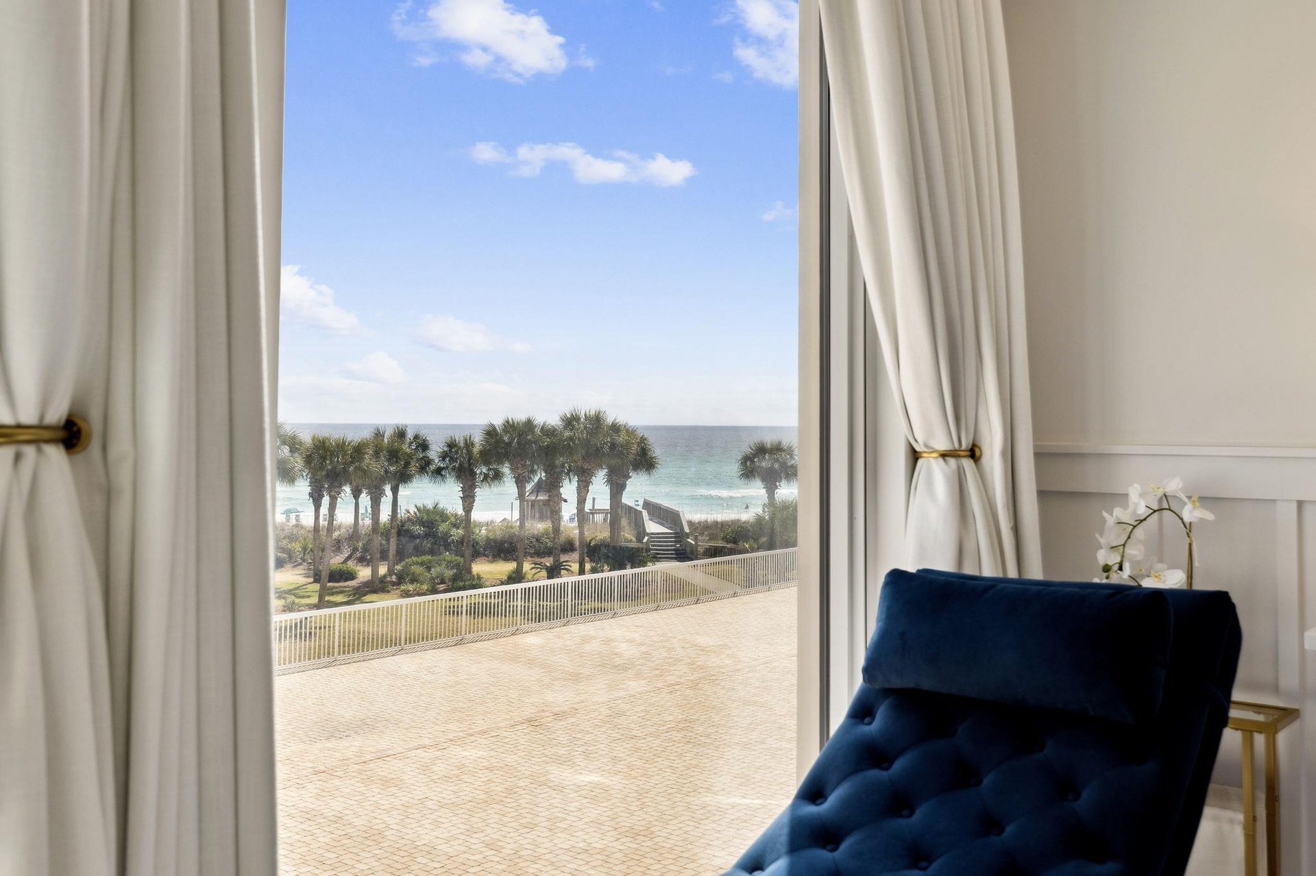 Wake up to stunning ocean views through elegant floortoceiling windows in your peaceful retreat.