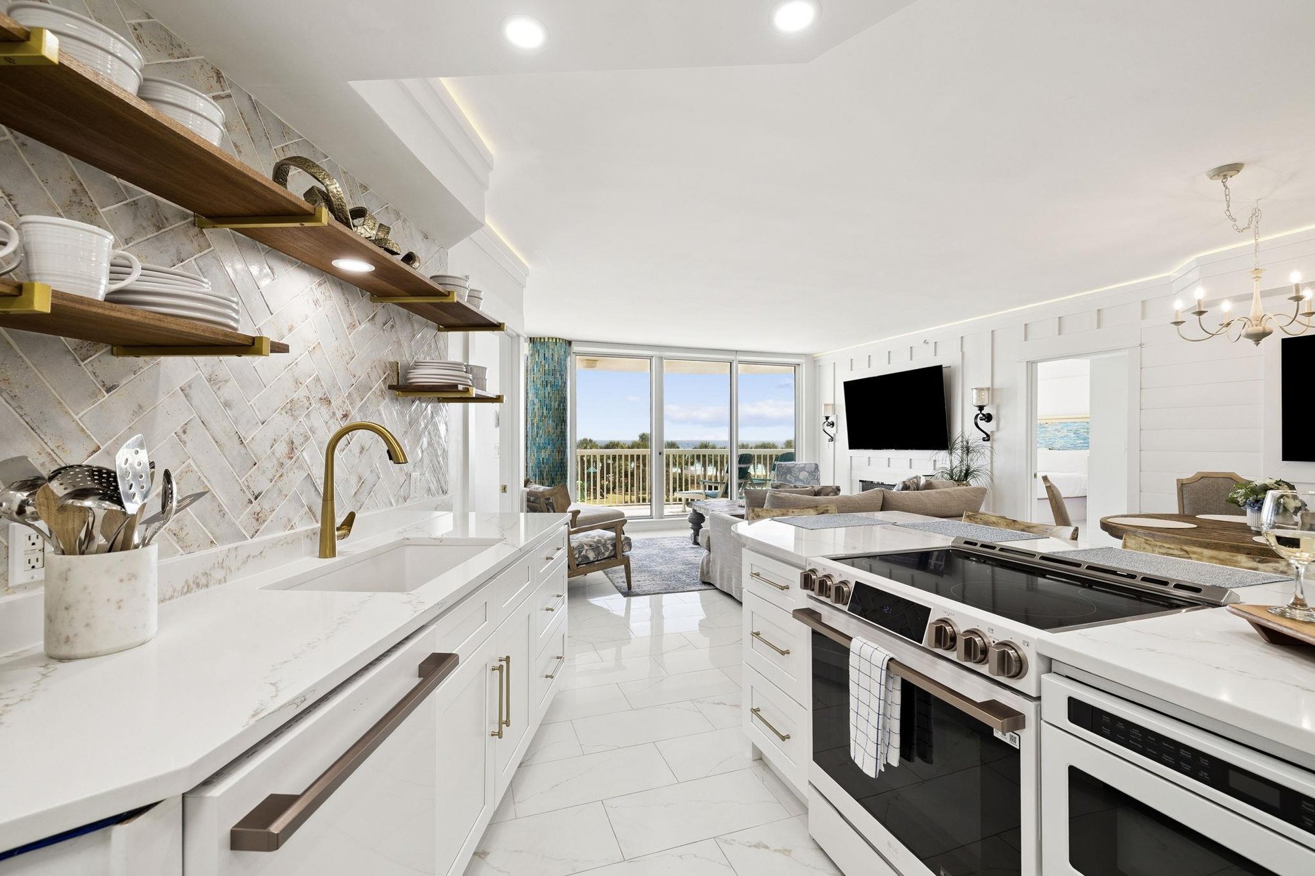 Kitchen open to living and dining and Gulf Virews