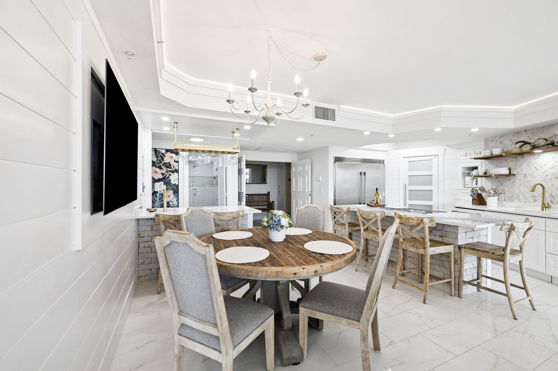 Gather around this beautiful dining table for memorable meals with your loved ones in this elegant openconcept space.