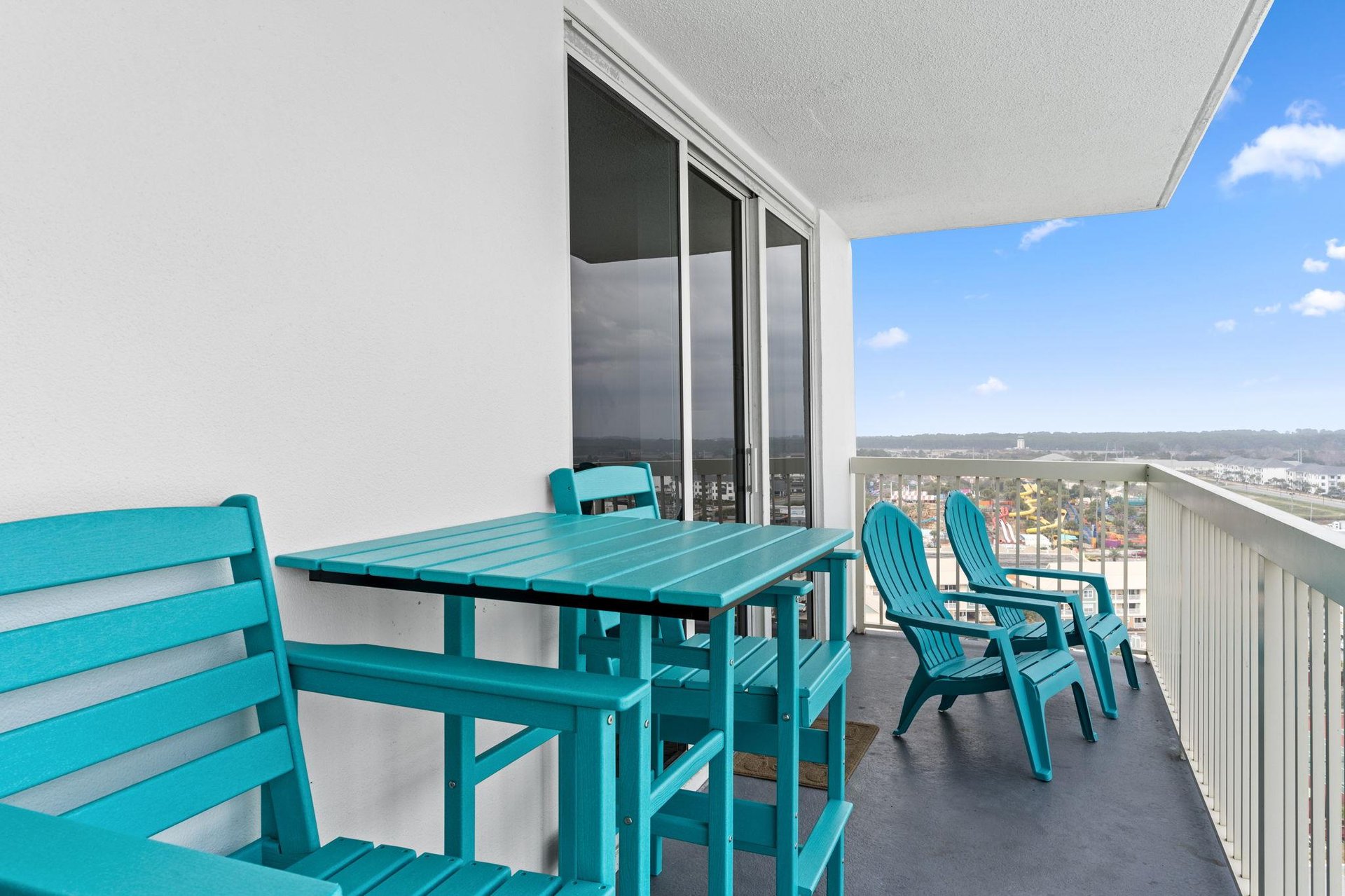 Balcony Dining Area and Lounge Chairs
