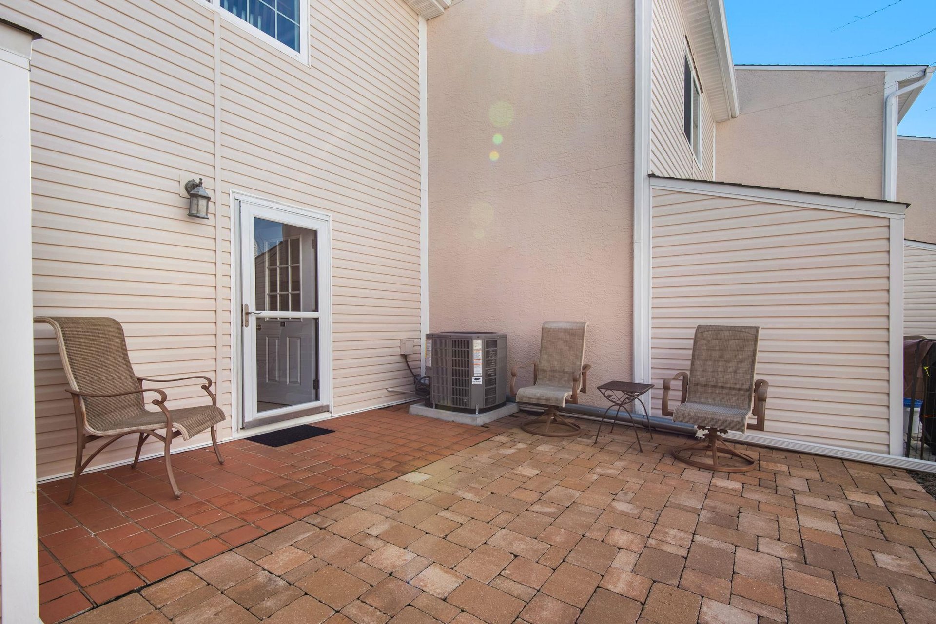 The private brick paved patio is perfect for morning coffee