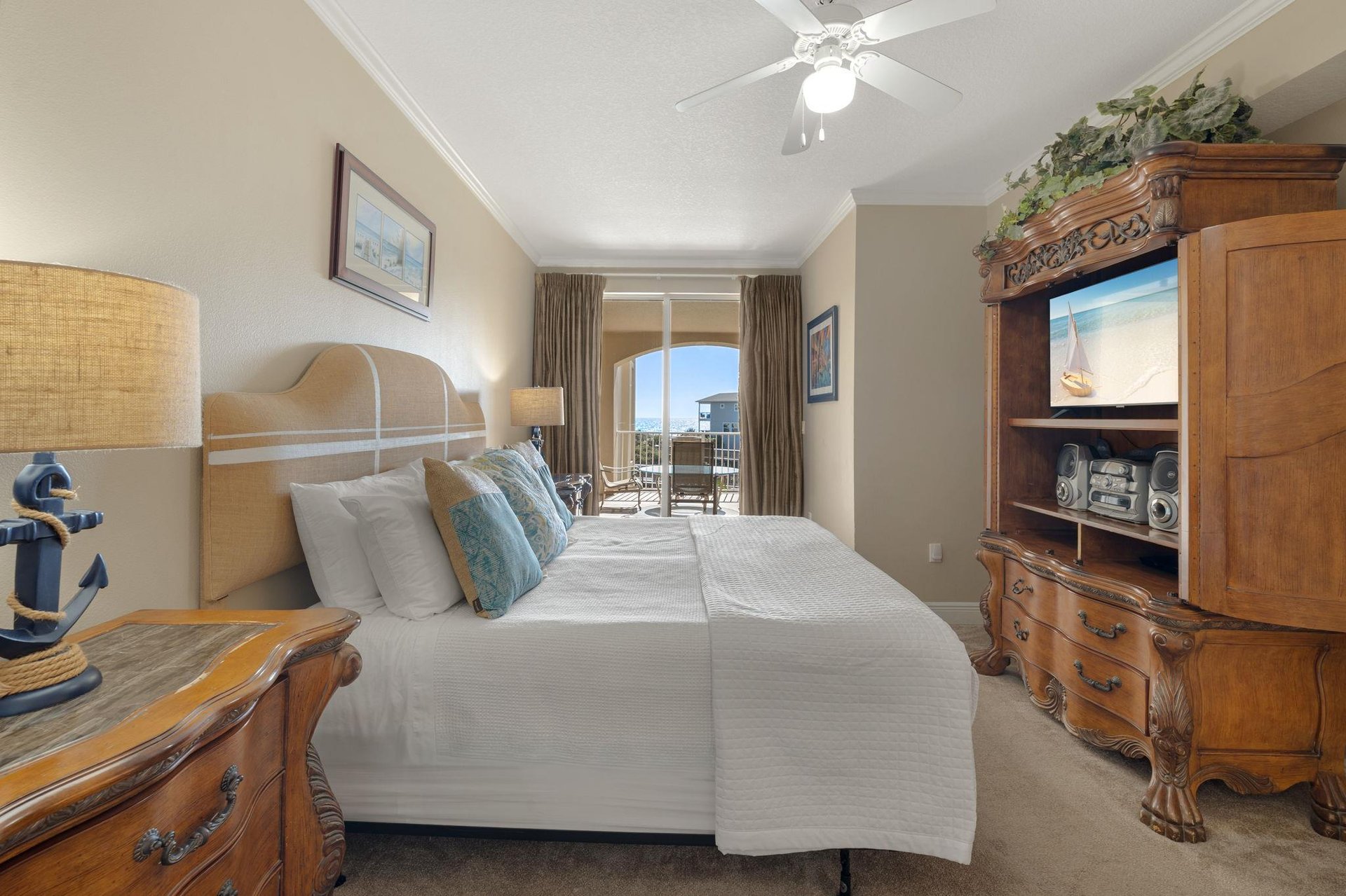 Sink into crisp white linens in your coastal bedroom, where ocean breezes flow through and nautical touches create a perfect seaside retreat.