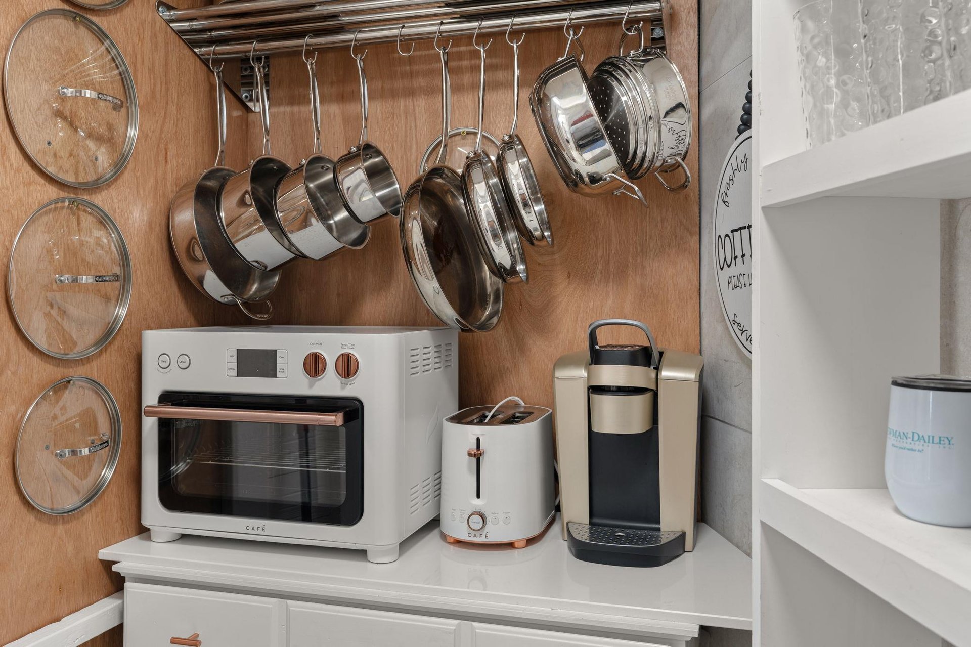 Your wellequipped kitchen features gleaming pots, modern appliances, and thoughtful storage to inspire culinary adventures during your stay.