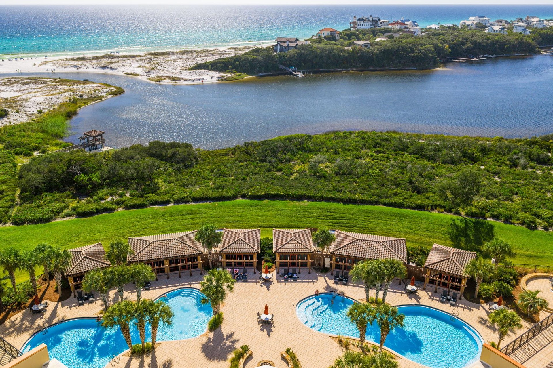 Relax by pools or Jacuzzis, gather around the fire pit, with direct access to the beach.