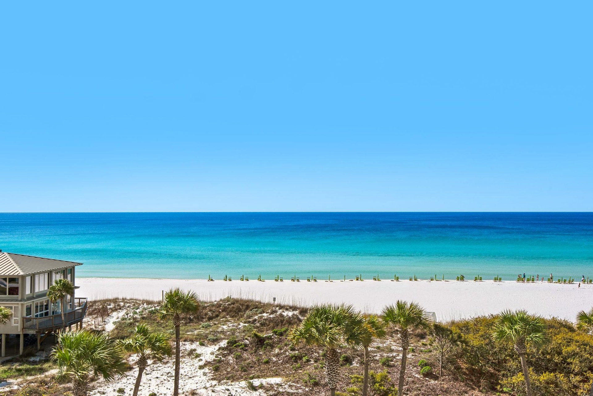 Stunning beachfront location with pristine white sand and crystalclear turquoise waters just steps from the property.
