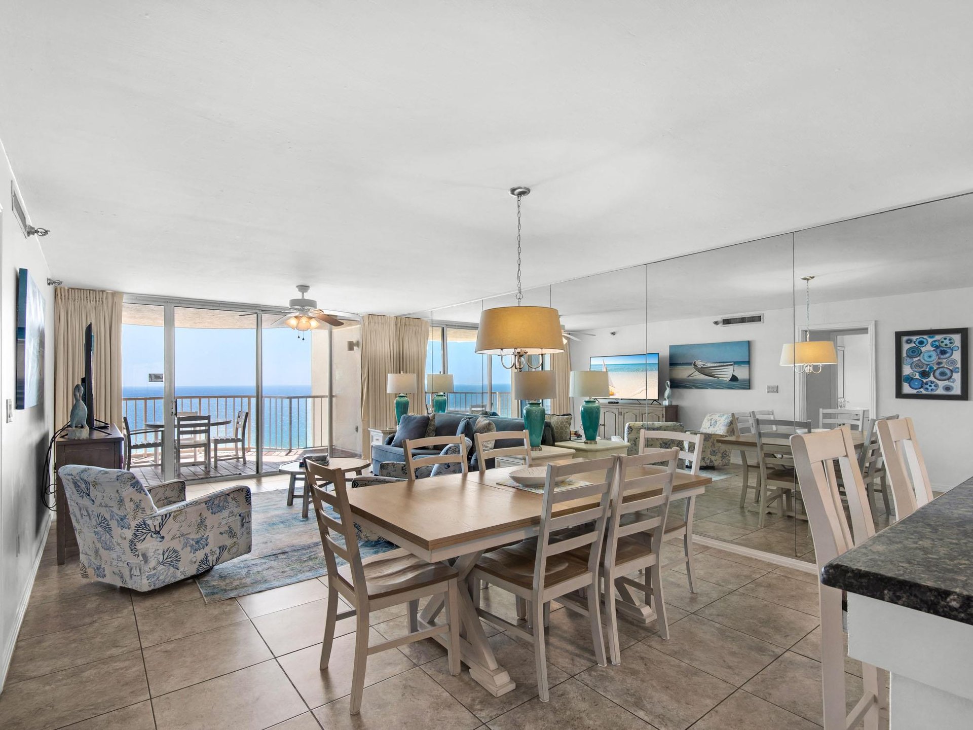 Your spacious oceanfront retreat features an openconcept layout where youll gather for meals while enjoying stunning sea views through floortoceiling windows.