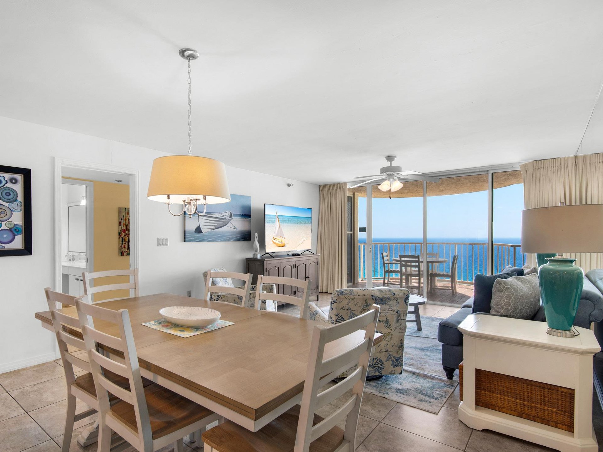 Step into your bright oceanfront retreat where coastal elegance meets comfort. Floortoceiling windows frame endless sea views from your private balcony.