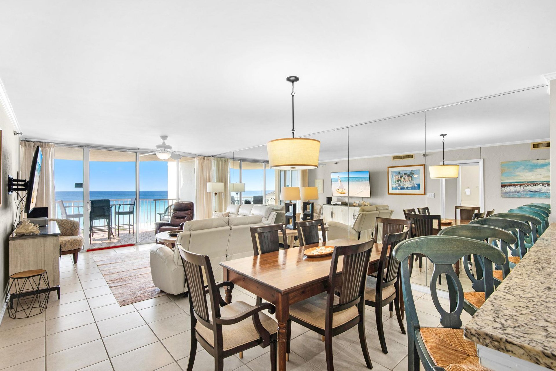 Savor meals at your dining table while enjoying stunning ocean views through floortoceiling windows.
