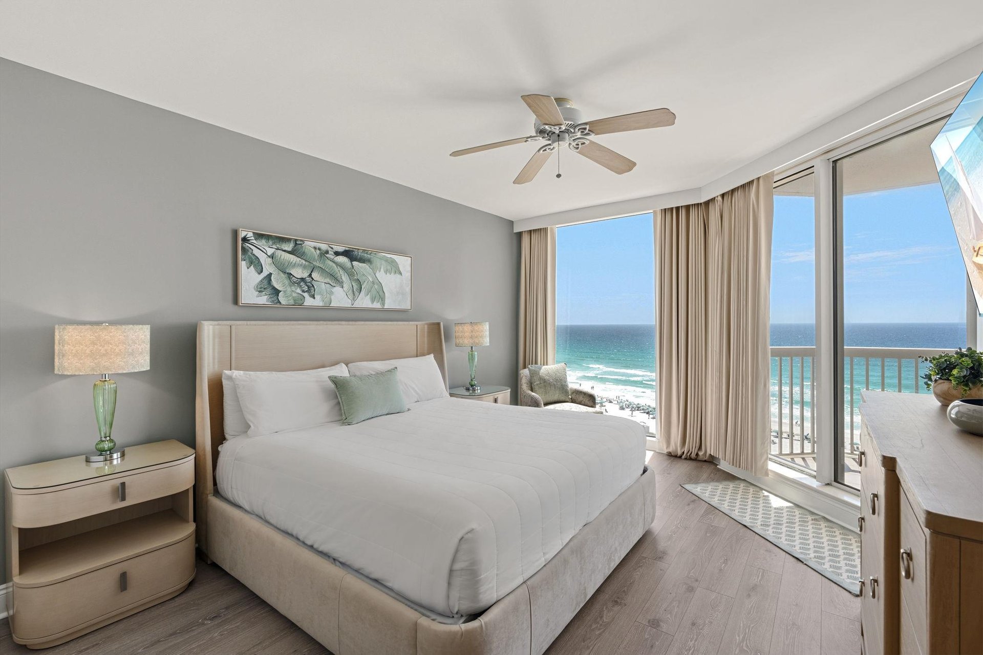 Wake up to breathtaking ocean views from your luxurious beachfront bedroom, where soft linens and sea breezes create the perfect coastal retreat.