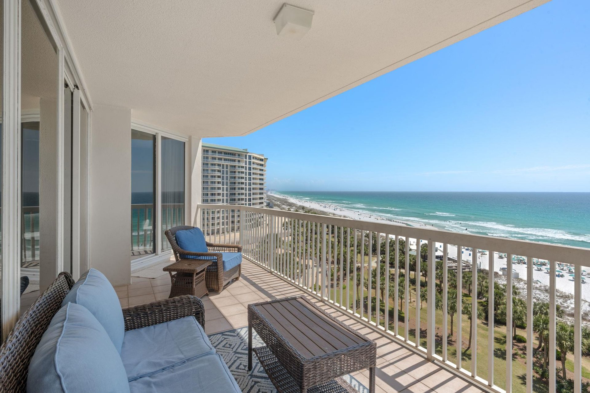 Unwind on your private balcony with plush seating and breathtaking ocean views stretching to the horizon.
